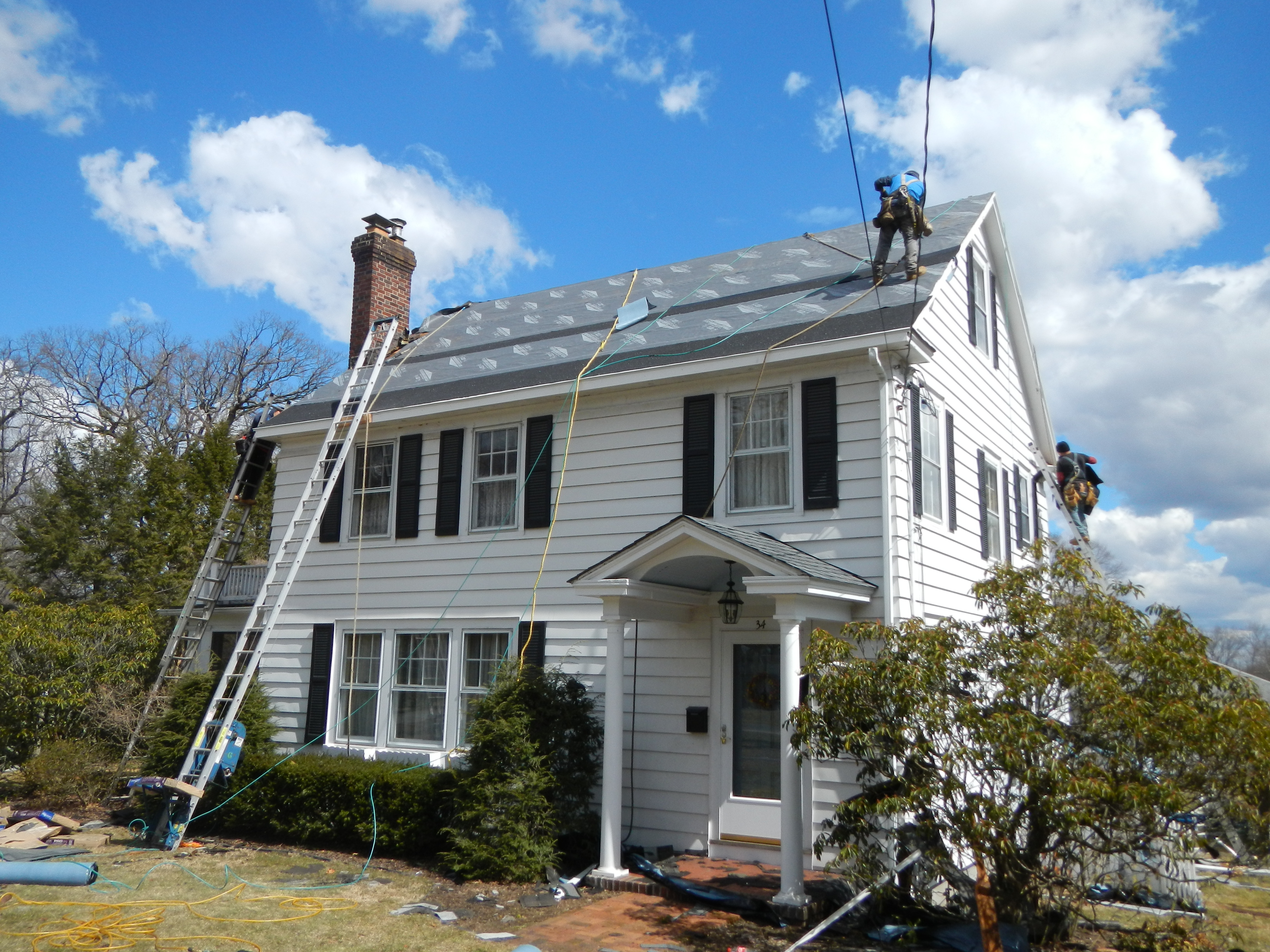 New asphalt roofs for both garage and house.